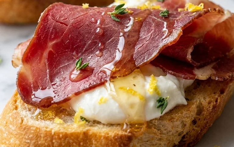 Beef Prosciutto Crostini with Burrata and Lemon Honey Drizzle